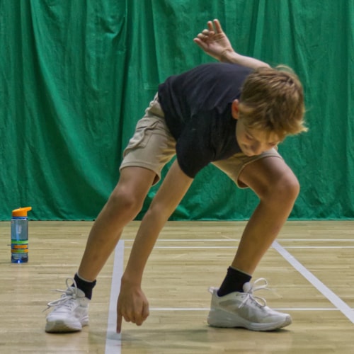 Swimmer doing backstroke in swimming pool